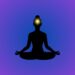 An illustration of the Ajna chakra showing a glowing indigo light at the forehead, symbolizing balanced inner vision, intuition, and spiritual awareness.