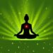 Silhouette of a person meditating with a glowing red heart chakra on a green starry background.